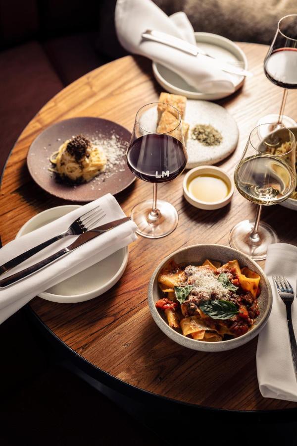 Next Hotel Melbourne, Curio Collection By Hilton Екстер'єр фото A selection of dishes at the restaurant